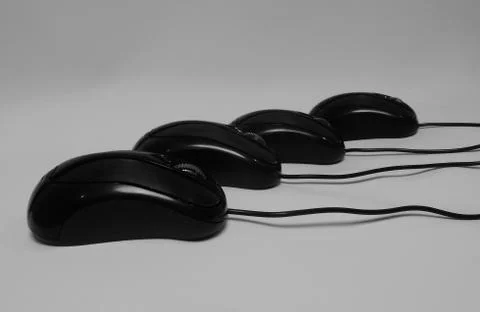 The four same computer mice detailed on white background Stock Photos