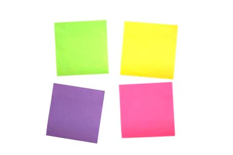 Four scattered post it notes Stock Photos
