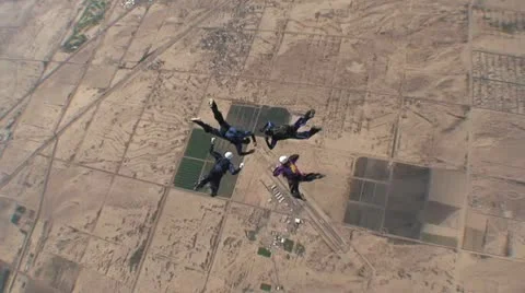 Four Skydivers Doing Aerial Acrobatics Video stock 19155936