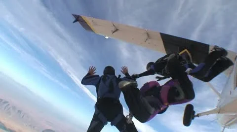 Four Skydivers Jump And Take Formation 스톡 동영상 19156712