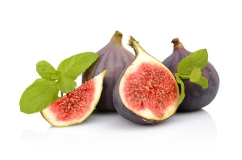 Four sliced figs lengthwise in half and quarter with mint leaves, isolated on Stock Photos