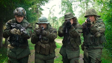 Four soldiers aim at the camera 스톡 동영상 92031463
