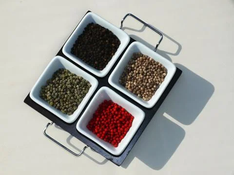 Four spices on white background Foto stock