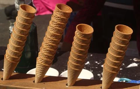 Four stacks of empty ice cream cones Stock Photos