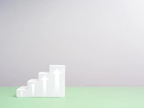 Four steps white rising up arrows on geometric cube blocks as growing bar g.. Stock Illustration