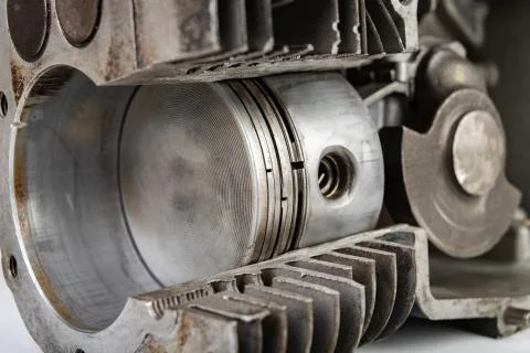 A four-stroke gasoline engine in section. The interior of a single-cylinder i Stock Photos