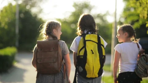 Four Students Are Talking and Walking In School Uniforms. Stock Footage 94585161