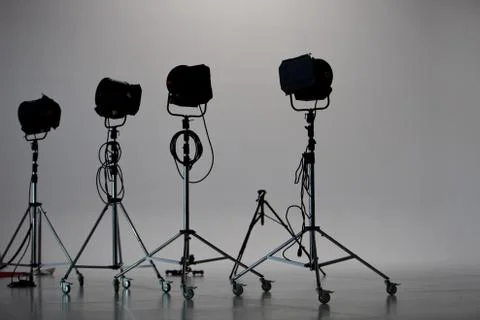 Four studio lights in studio Stock Photos