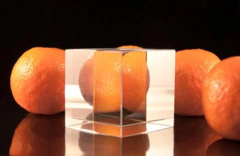 Four tangerines with cube Stock Photos