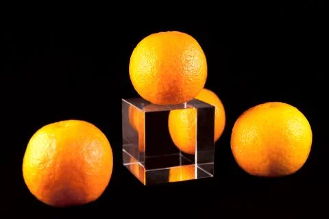 Four tangerines Stock Photos