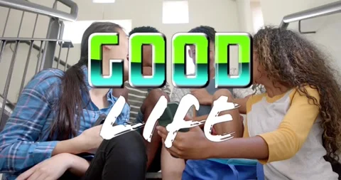 Four teens sitting on school steps, GOOD LIFE title sliding across, leaning, Stock Footage 330647122