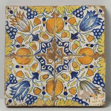 Four tiles (2x2) with a multicolor pattern in blue, yellow, orange and pur... Stock Photos