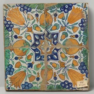 Four tiles with pattern of grape fees, tulips, pomegranates and stars. Fie... Stock Photos
