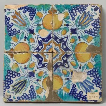 Four tiles with pattern of grape fees, stars, tulips and pomegranates. Fie... Stock Photos
