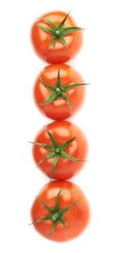 Four tomatoes in a line isolated 스톡 사진