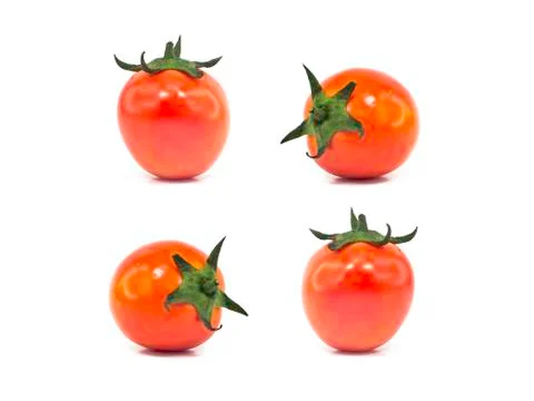 Four tomatoes Stock Photos