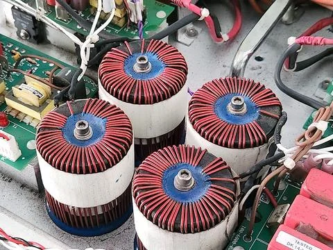 Four Toroidal Inductors in Power Filter System. Stock Photos