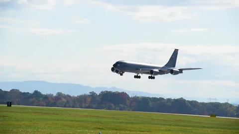 Four U.S. Air Force KC-135 Stratotanker aircraft approaching runway for landing Stock Footage 291637139