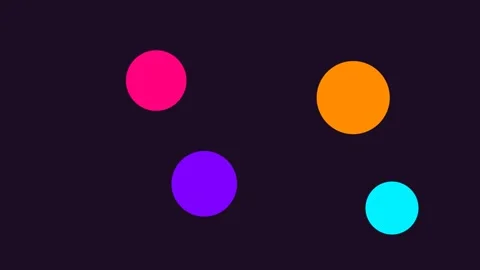 Four vibrant colorful circles floating against a solid deep dark background Video stock 338310557