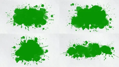 Four vibrant green paint splashes on white paper background. Stock Footage 335743096