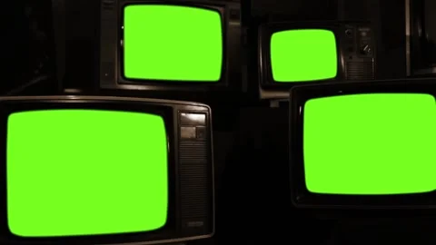 Four Vintage TV Sets Lighting Up Green Screens, Sepia Tone Stock Footage 100004332