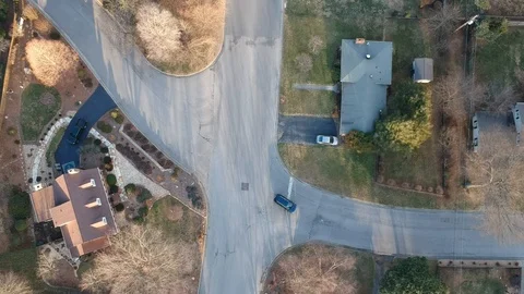 Four way intersection with multiple cars driving by Stock Footage 125268137