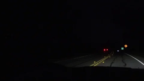 Four way stop at night Video stock 129835844