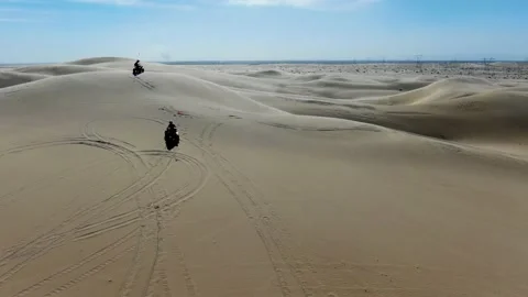 Four wheeling in sand dunes Stock Footage 141765893
