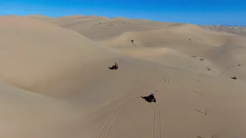 Four-wheeling in sand dunes Stock Footage 141774354