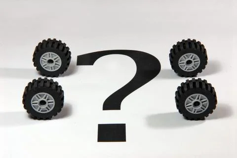 Four wheels and a questionnaire Stock Photos