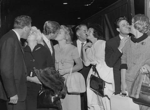 Four Wives Off To Paris To Do Some Shopping Leaving Their Husbands Behind. Kissi Stock Photos