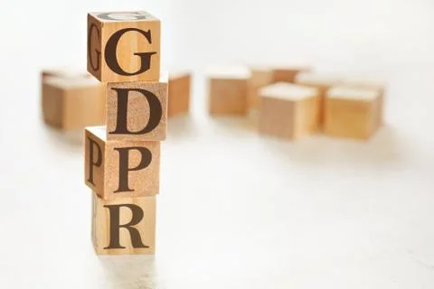 Four wooden cubes arranged in stack with letters GDPR meaning General Data Stock Photos