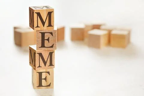 Four wooden cubes arranged in stack with word MEME on them, space for text /  스톡 사진