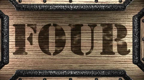 Four on wooden stamp Stock Footage 8775697