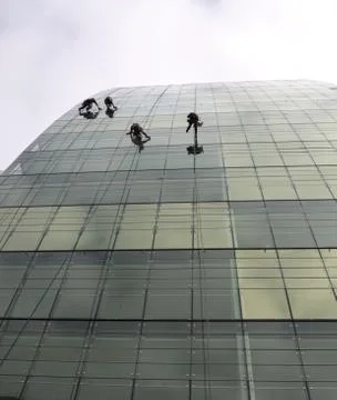 Four workers hard at work Stock Photos