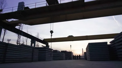 Four workers walk through the factory Video stock 172240772