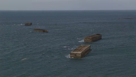 Four WWII Phoenix blocks remnants Normandy, France Stock Footage 101207424