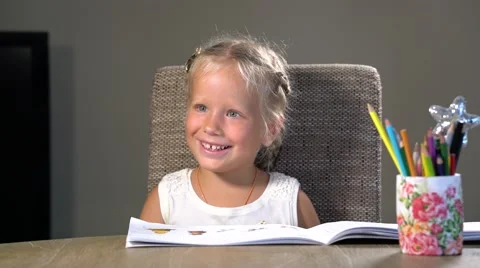 Four-year girl performs educational tasks Stock Footage 64847662