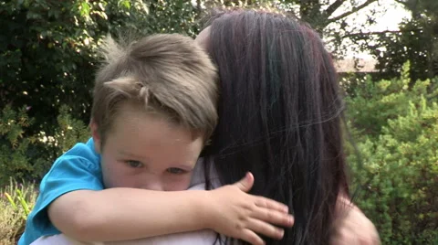 Four year old boy cuddling and loving mother Stock Footage 46372527