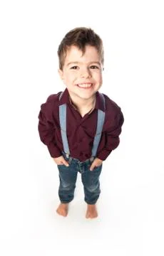 A four year old boy posing over white studio background Foto stock