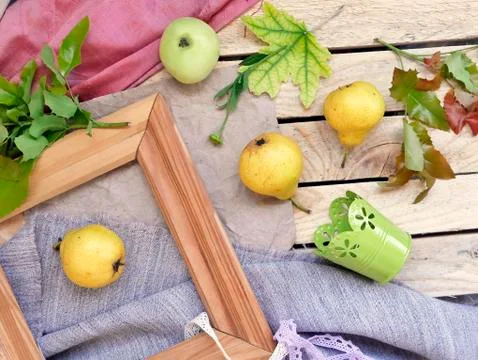 Four yellow pears on a light texture textured background of wood Stock Photos