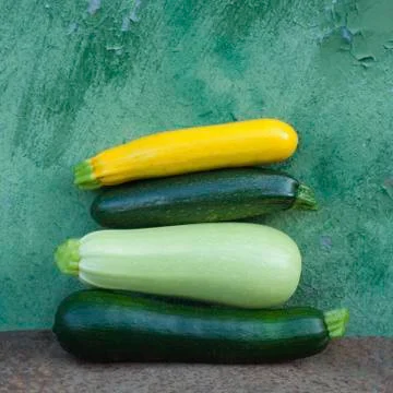 Four zucchini Stock Photos