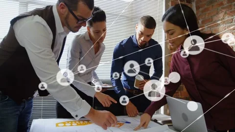 Fourth joining frame starting network map growing over plans while team Stock Footage 332981374
