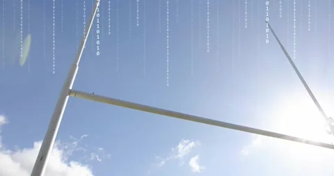 At fourth second binary code raining over rugby goalposts as ball falling 스톡 동영상 317592009