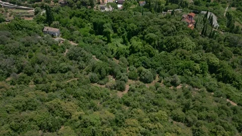 Fourth of six videos of a small town in the middle of mountains Stock Footage 245374073