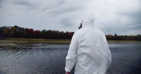 Fourth Wave Delta Variant: lockdown hazardous material suit during the fall 스톡 동영상 159665687