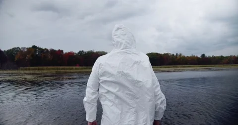 Fourth Wave Delta Variant: lockdown hazardous material suit during the fall Stock Footage 159665780