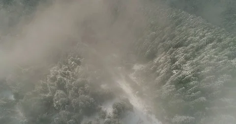Foward Down Mountain through snow and fog Stock Footage 91470348