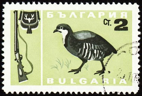 Fowl bird on post stamp Stock Photos