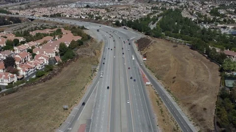 Fowrard looking with a slight tilt up shot of Highway 14 near Sierra Hwy offramp Stock Footage 218574388